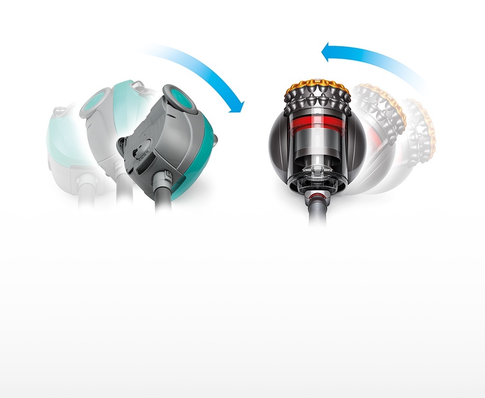 A conventional, wheeled cylinder vacuum falling over.